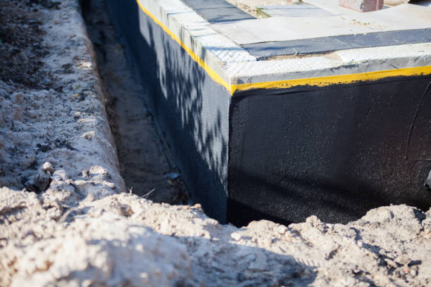 Professional Waterproofing technician working in Randolph, WI